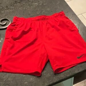 Men’s Nike shorts, red, size small